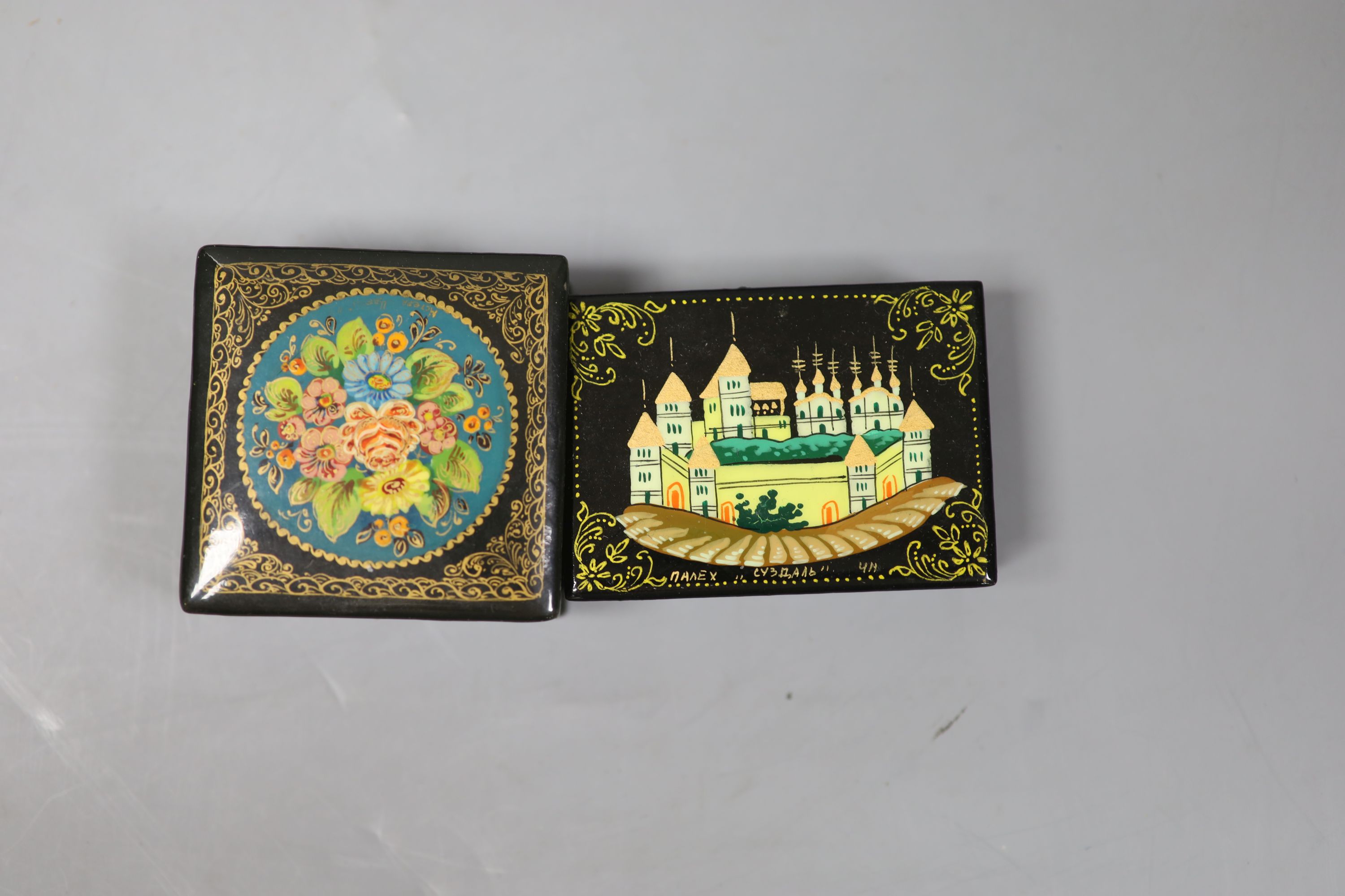 Twelve Russian or Persian Papier mache boxes